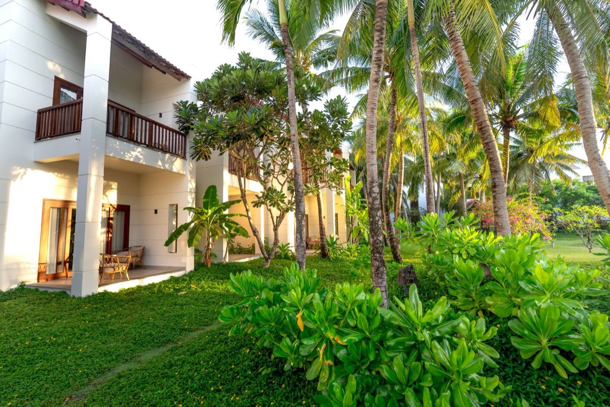 Modern hotel garden with traditional elements